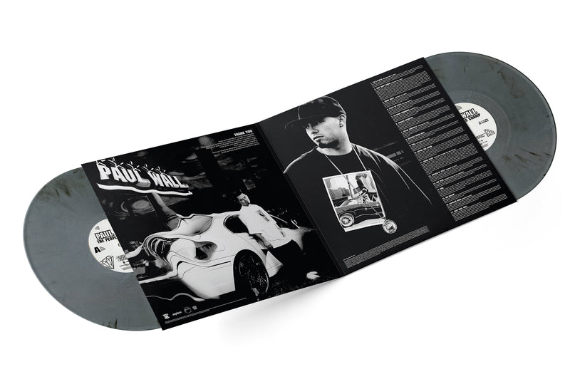 inside gatefold jacket of Paul Wall's Peoples Champ album with credits and photos of  Paul wall and Silver Smoke colored records 