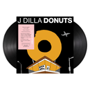 black Vinyl record with 'J Dilla Donuts' cover featuring a donut and building illustration.
