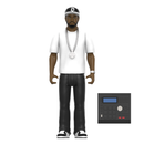 Action figure of a J Dilla wearing a white shirt, black pants, and a cap, with a small electronic device on a white background.
