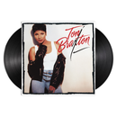 Vinyl record with a cover featuring a person and the name 'Toni Braxton' on a white background.