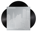 Vinyl record with a cityscape design on the cover against a white background
