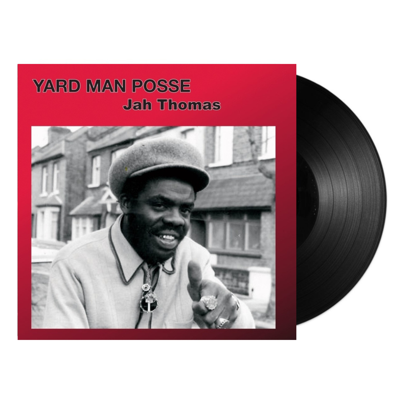 Vinyl record with a red label featuring a black and white photo of a man and text 'Yard Man Posse Jah Thomas'.